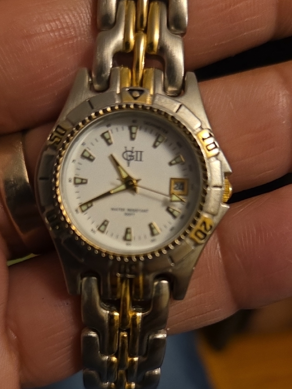 VG 11 watch,women's,stainless steel band,date window